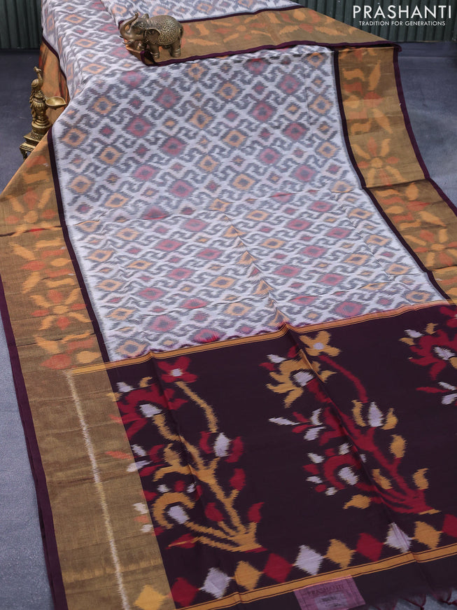 Ikat silk cotton saree off white and deep wine shade with allover ikat weaves and long ikat woven border