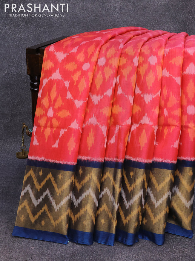 Ikat silk cotton saree pinkish orange and peacock blue with allover ikat weaves and long ikat woven border