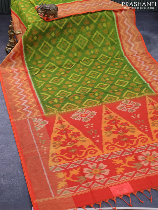 Ikat silk cotton saree light green and orange with allover ikat weaves and long ikat woven border