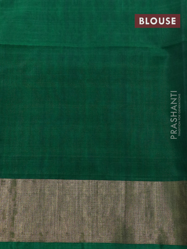 Ikat silk cotton saree light pink and green with allover ikat weaves and zari woven border