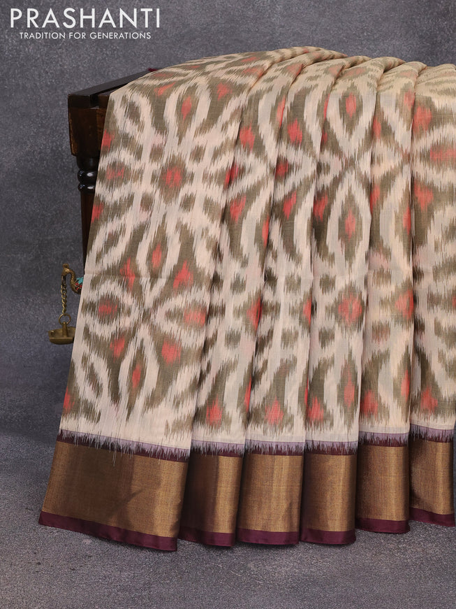 Ikat silk cotton saree cream and brown with allover ikat weaves and zari woven border