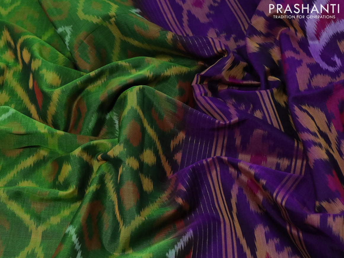 Ikat silk cotton saree green and violet with allover ikat weaves and zari woven border
