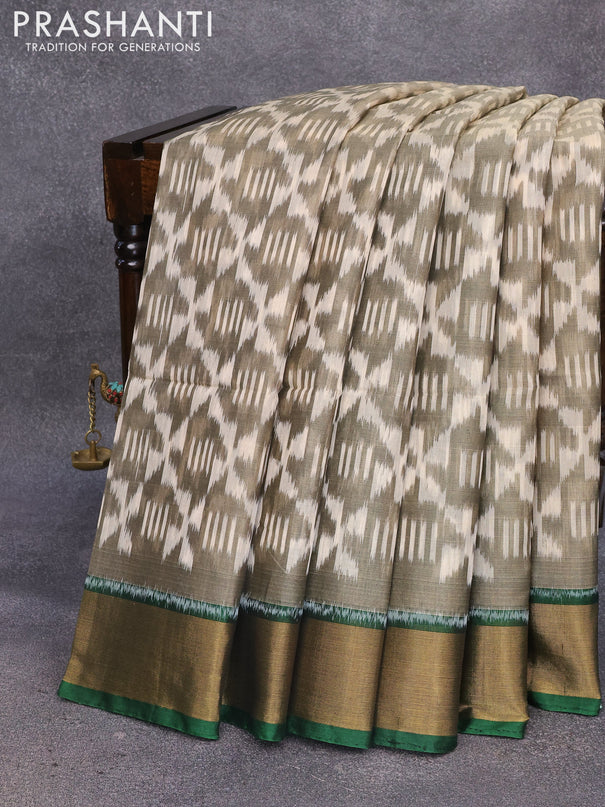 Ikat silk cotton saree cream and green with allover ikat weaves and zari woven border