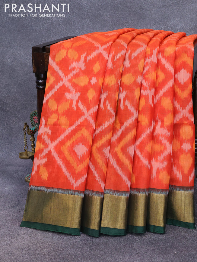 Ikat silk cotton saree orange and dark green with allover ikat weaves and zari woven border