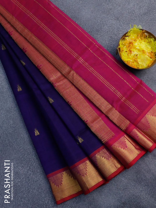 Silk cotton saree dark blue and magenta pink and temple design zari woven buttas and temple design zari woven border