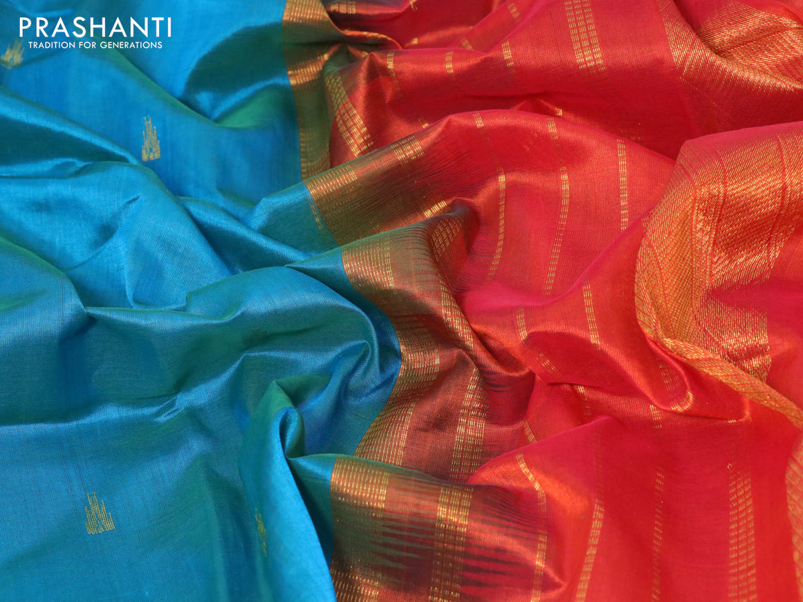 Silk cotton saree dual shade of teal blue and orange with zari woven buttas and zari woven border