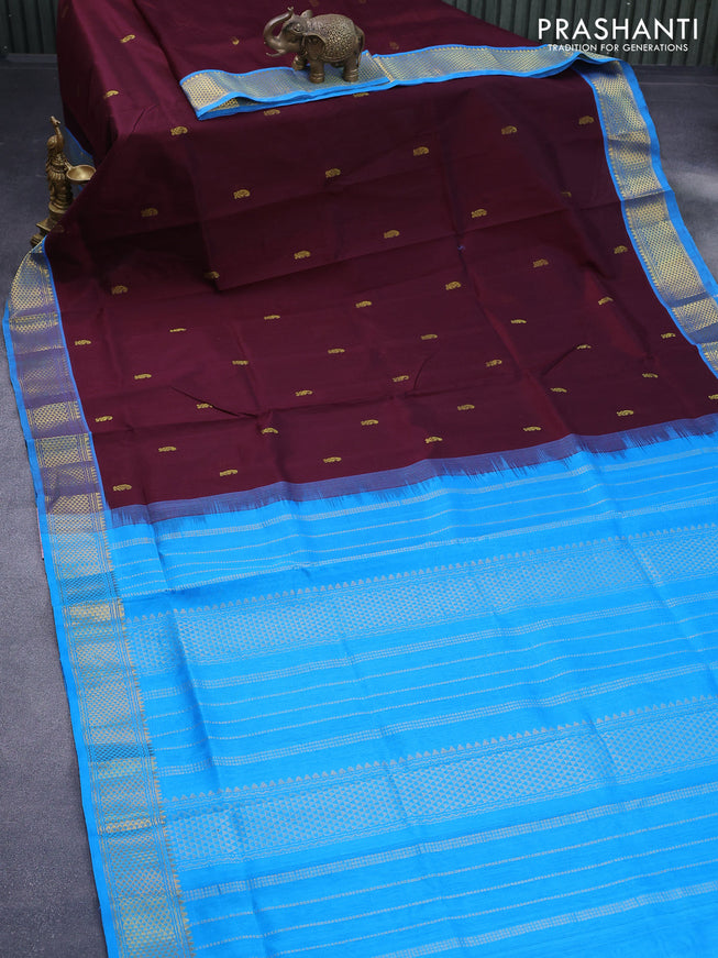 Silk cotton saree coffee brown and cs blue with zari woven buttas and zari woven border