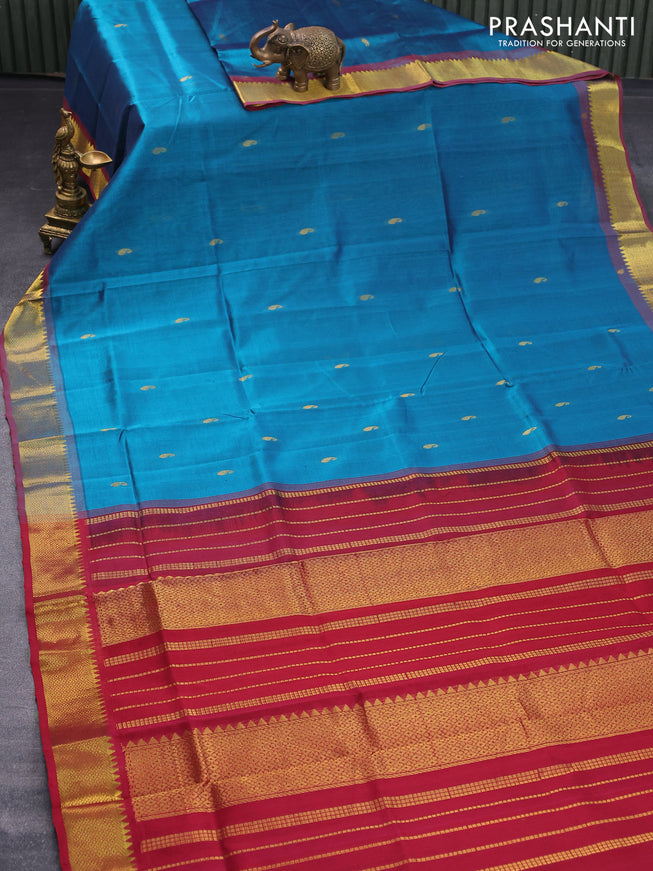 Silk cotton saree peacock blue and maroon with paisley zari woven buttas and zari woven border