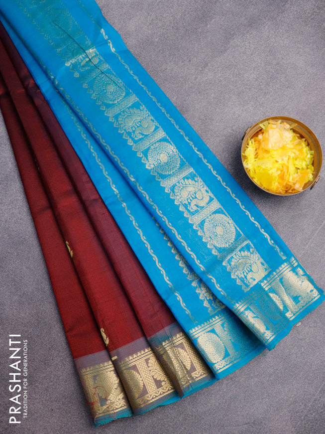Silk cotton saree deep maroon and cs blue with zari woven buttas and annam zari woven border