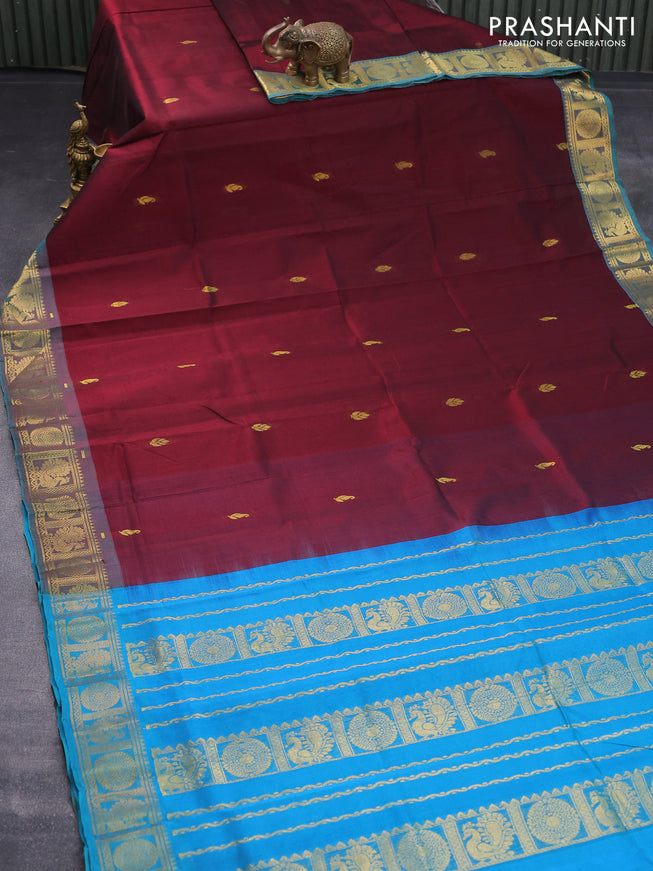 Silk cotton saree deep maroon and cs blue with zari woven buttas and annam zari woven border