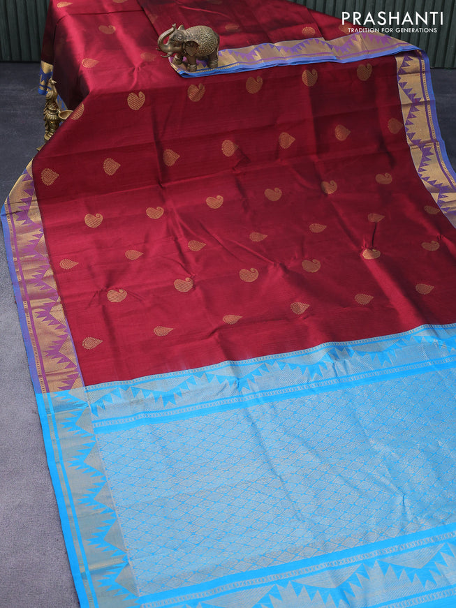 Silk cotton saree maroon and cs blue with zari woven buttas and temple zari woven border