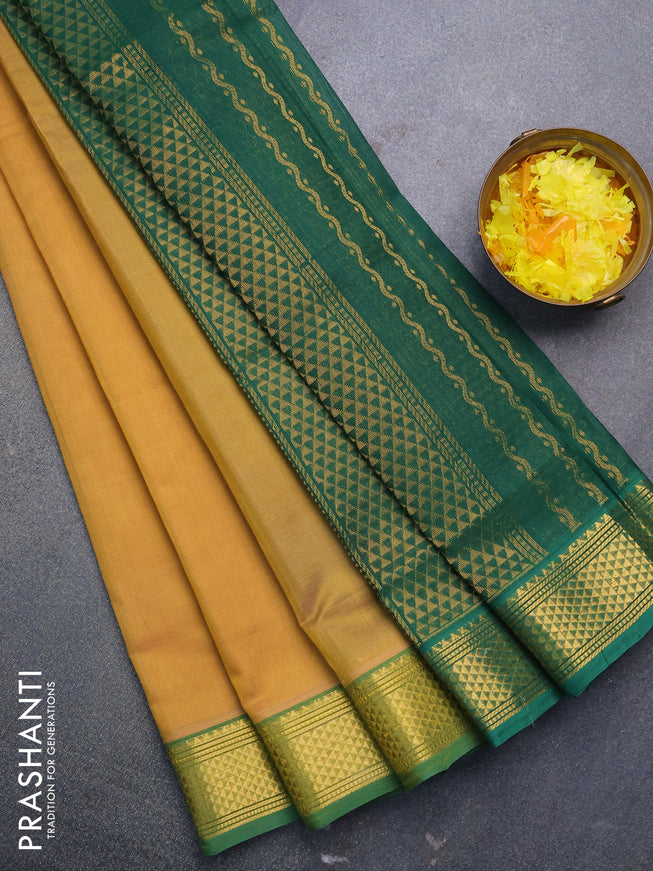 Silk cotton saree yellow shade and green with zari woven buttas and zari woven border
