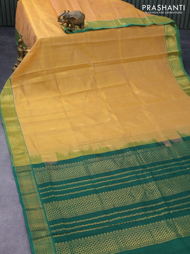 Silk cotton saree yellow shade and green with zari woven buttas and zari woven border