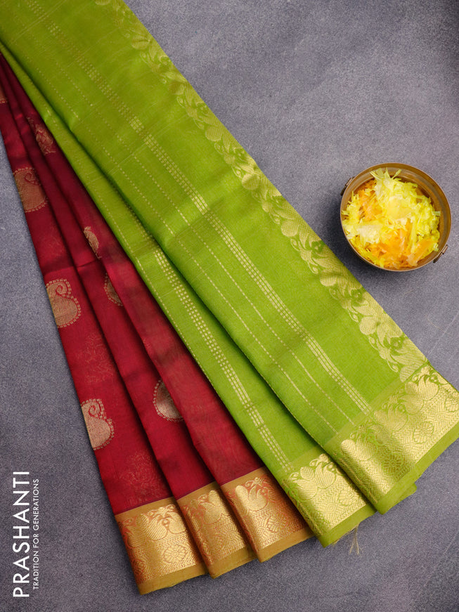 Silk cotton saree dark magenta pink and light green with zari woven buttas and zari woven border
