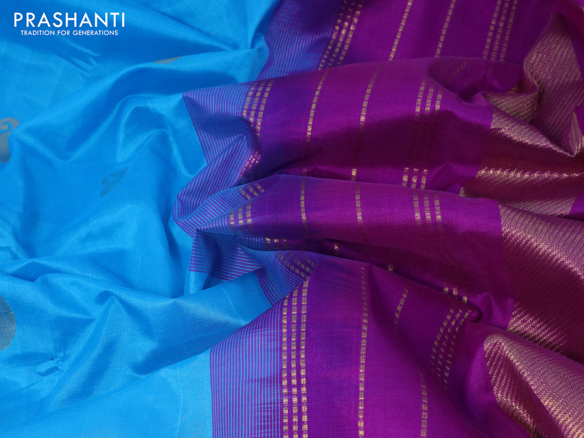Silk cotton saree blue and purple with paisley zari woven buttas and zari woven border