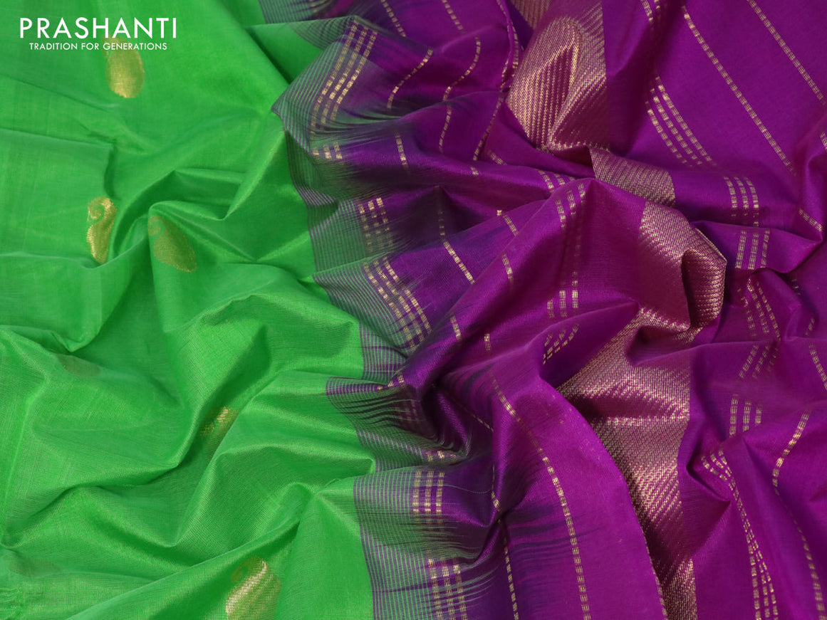 Silk cotton saree green and purple with paisley zari woven buttas and zari woven border