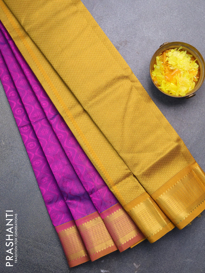 Silk cotton saree purple and mustard yellow with allover self emboss jacquard and zari woven border