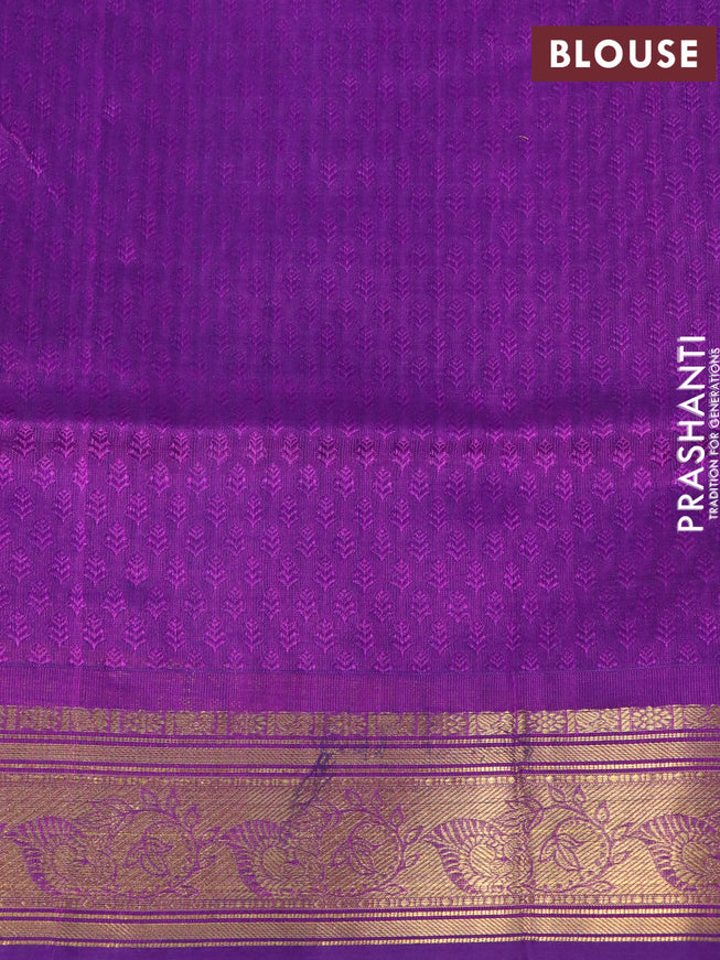 Silk cotton saree teal blue and purple with allover self emboss jacquard & zari buttas and zari woven border