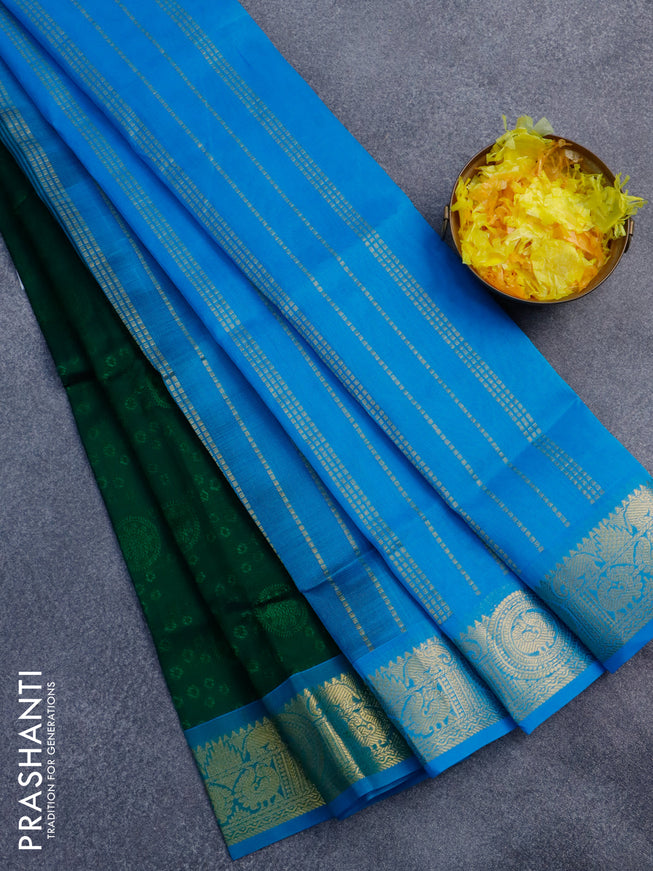Silk cotton saree green and light blue with allover self emboss jacquard and zari woven border