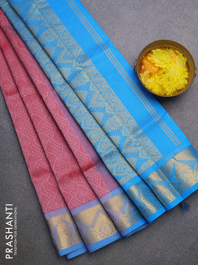 Silk cotton saree maroon shade and cs blue with allover self emboss jacquard and temple design zari woven border