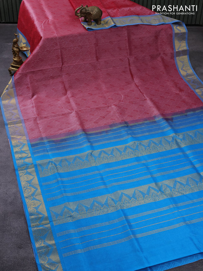 Silk cotton saree maroon shade and cs blue with allover self emboss jacquard and temple design zari woven border