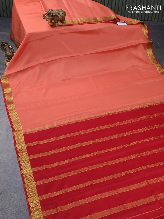Mysore silk saree peach orange and red with plain body and zari woven border plain body