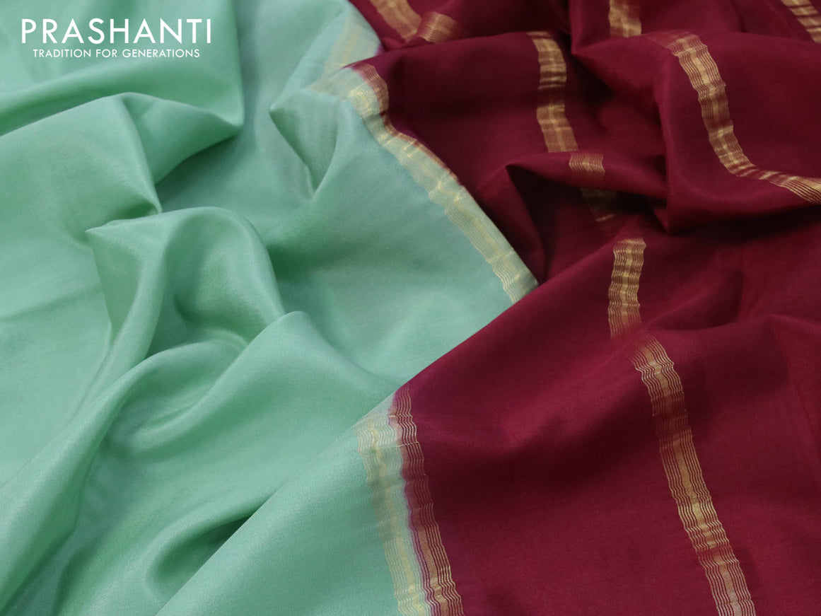 Mysore silk saree pastel green and maroon with plain body and zari woven border plain body