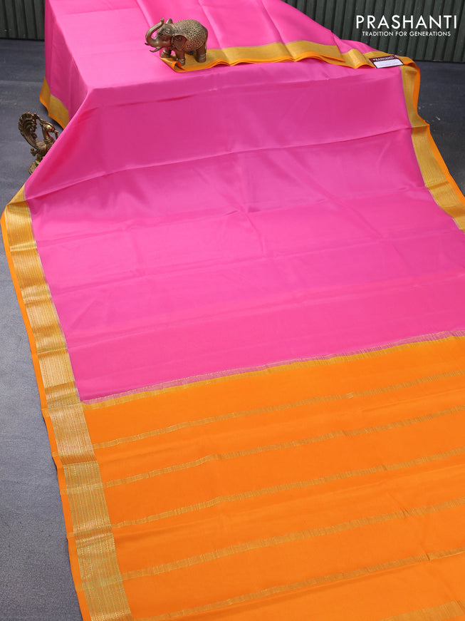 Mysore silk saree pink and orange with plain body and zari woven border plain body