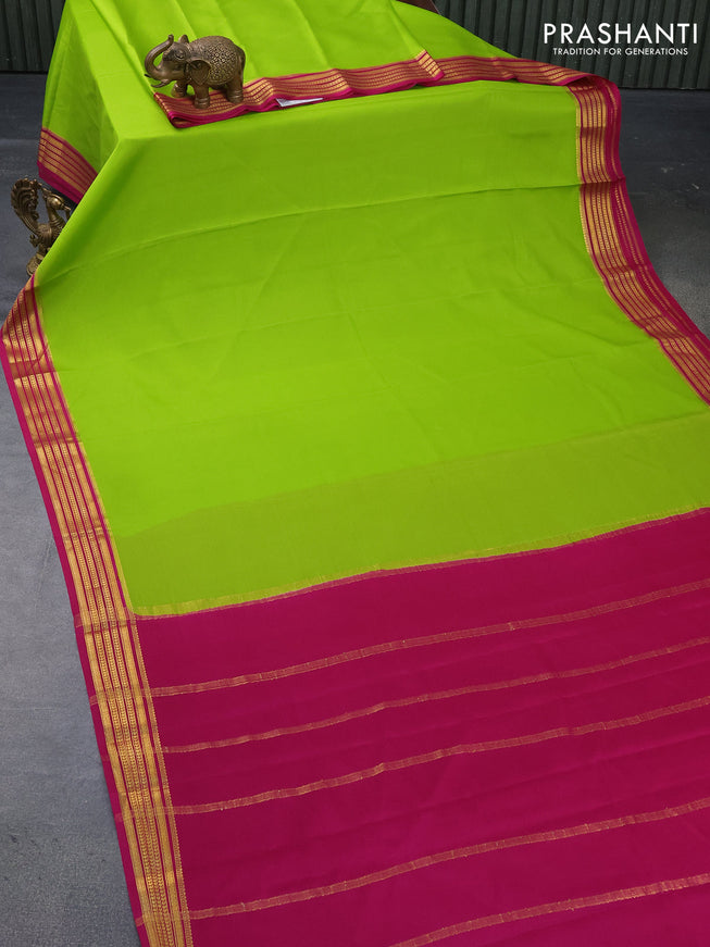 Mysore silk saree fluorescent green and pink with plain body and zari woven border plain body