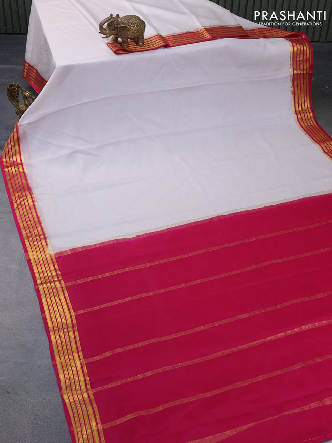 Mysore silk saree off white and pink with plain body and zari woven border plain body