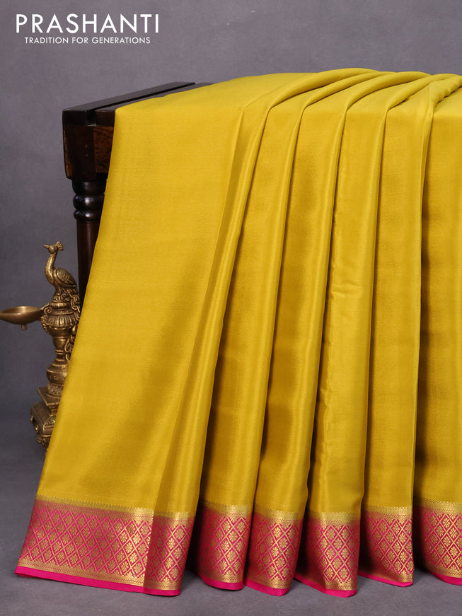 Mysore silk saree mustard yellow and pink with plain body and zari woven border plain body