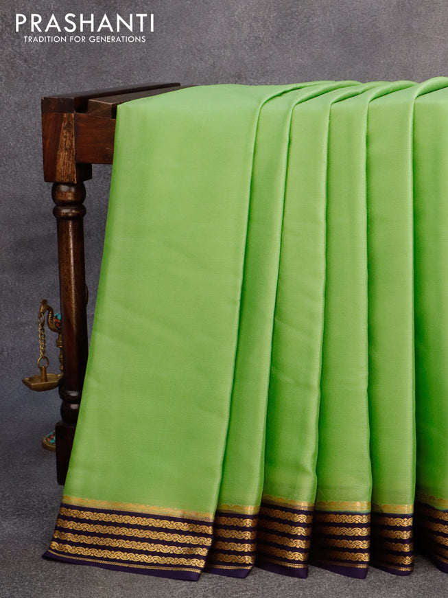 Mysore silk saree light green and blue with plain body and zari woven border plain body