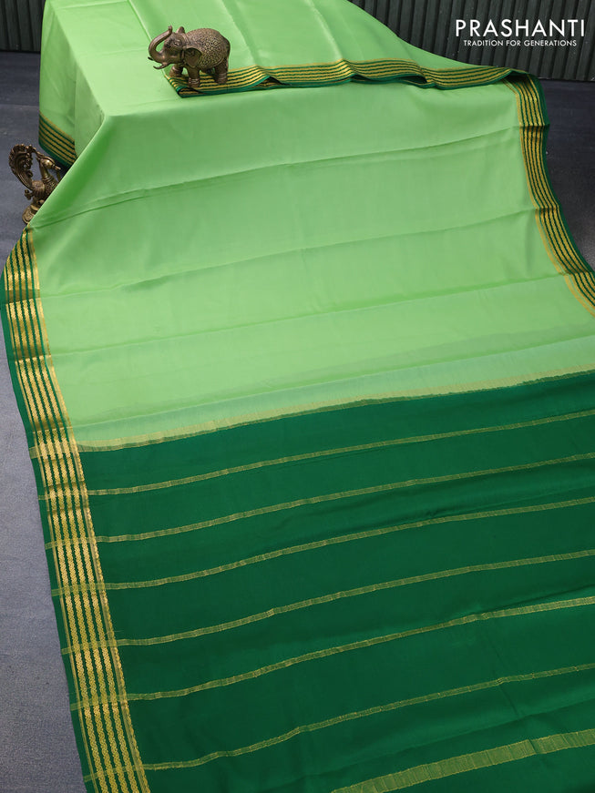 Mysore silk saree light green and green with plain body and zari woven border plain body