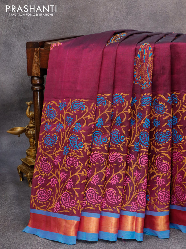 Silk cotton block printed saree purple and cs blue with allover prints and zari woven border