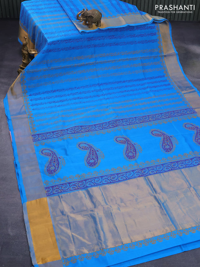 Silk cotton block printed saree cs blue with allover prints and zari woven border