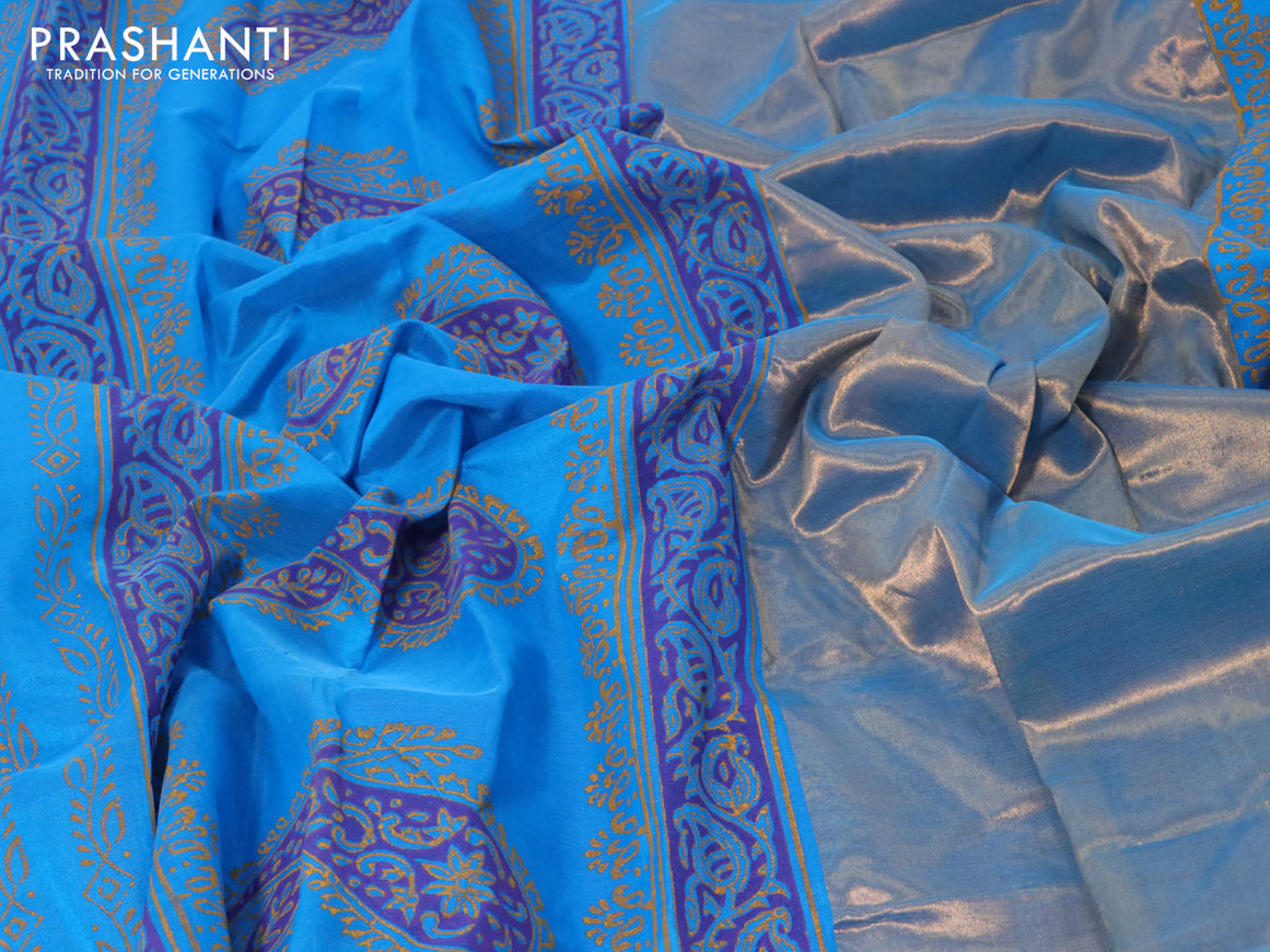 Silk cotton block printed saree cs blue with allover prints and zari woven border