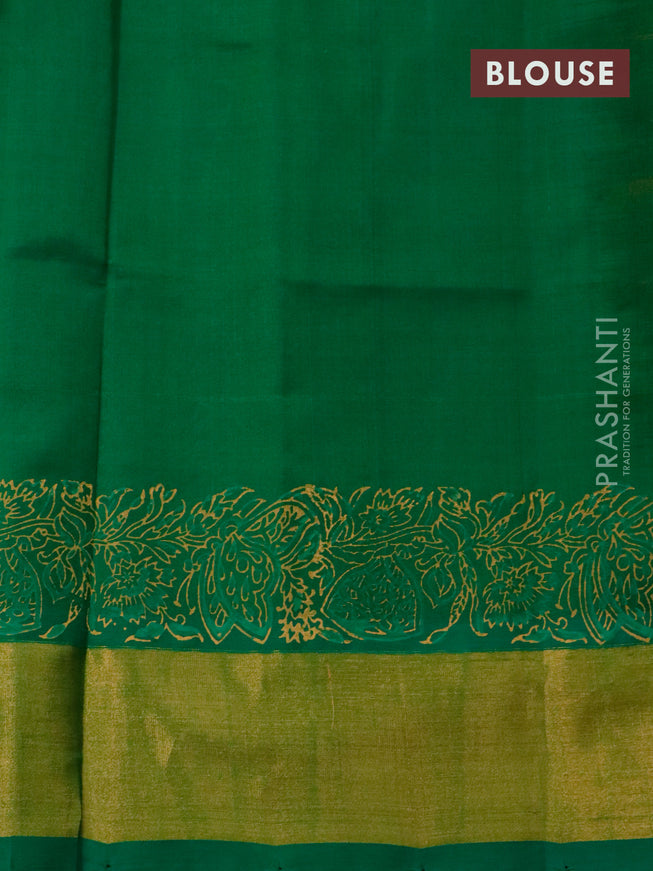 Silk cotton block printed saree orange and green with allover prints and zari woven border