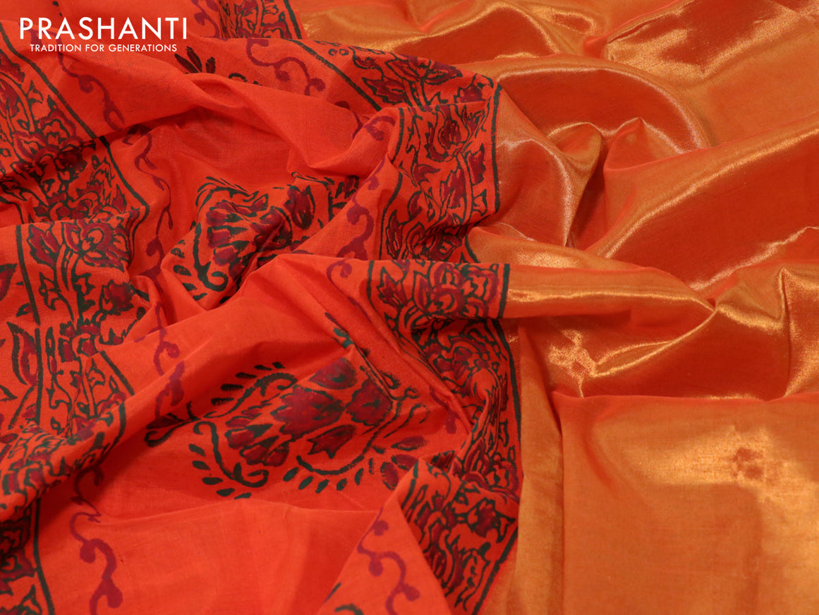 Silk cotton block printed saree orange with allover prints and zari woven border