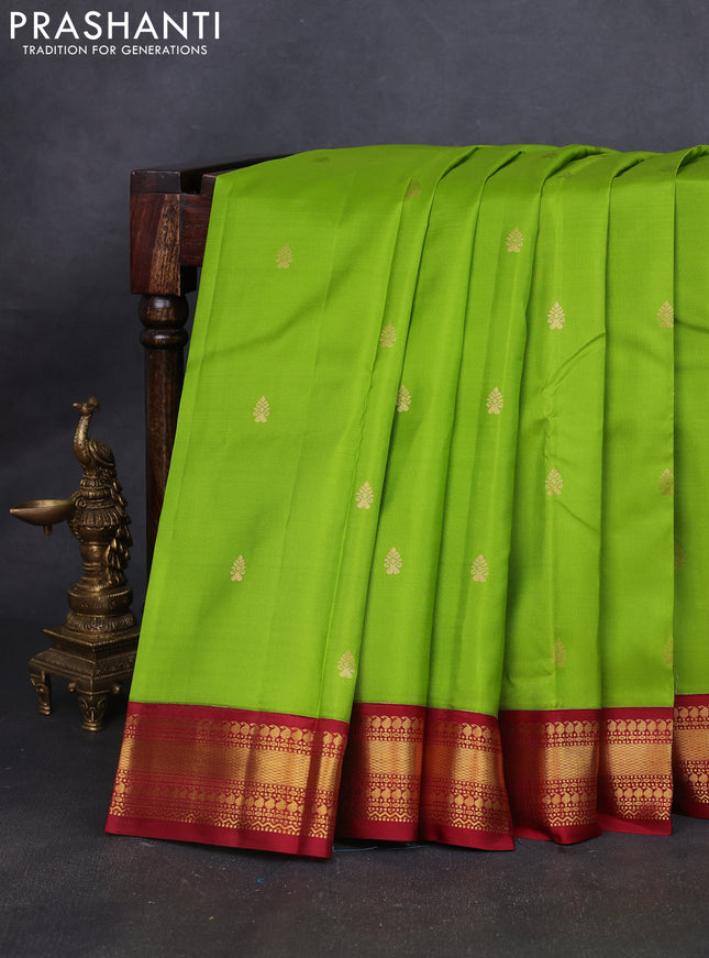 Pure kanchipuram silk saree light green and maroon with zari woven buttas and zari woven korvai border