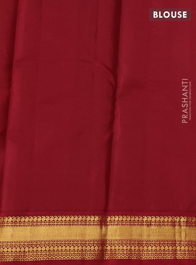 Pure kanchipuram silk saree light green and maroon with zari woven buttas and zari woven korvai border