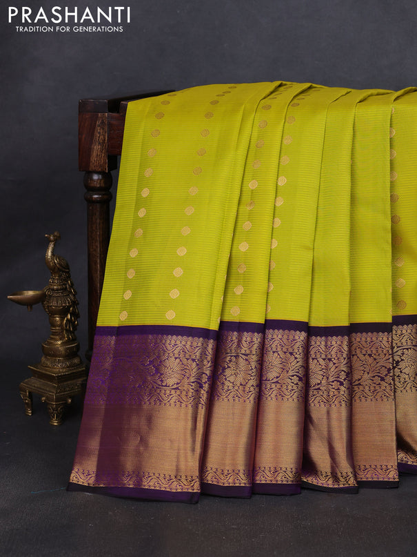 Pure kanchipuram silk saree lime yellow and purple with allover zari stripe weaves & buttas and long floral zari woven korvai border