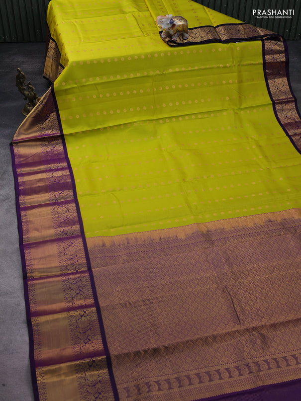 Pure kanchipuram silk saree lime yellow and purple with allover zari stripe weaves & buttas and long floral zari woven korvai border