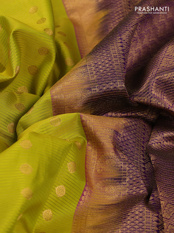 Pure kanchipuram silk saree lime yellow and purple with allover zari stripe weaves & buttas and long floral zari woven korvai border