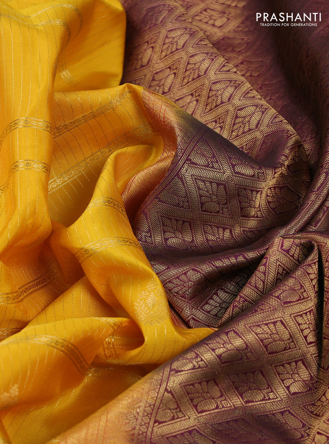 Pure kanchipuram silk saree yellow and wine shade with allover zari weaves & buttas and rich zari woven korvai border