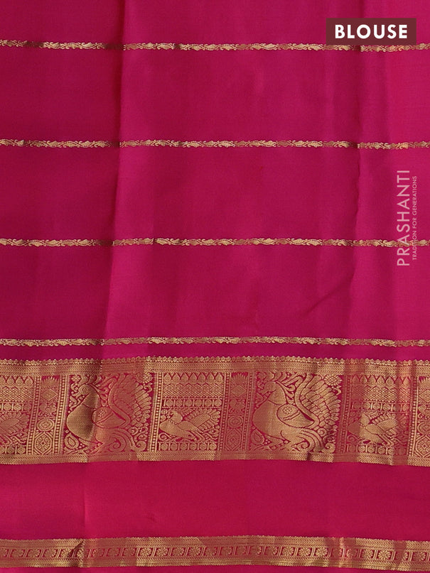 Pure kanchipuram silk saree dual shade of bluish green and pink with allover zari checks & buttas and rettapet zari woven border
