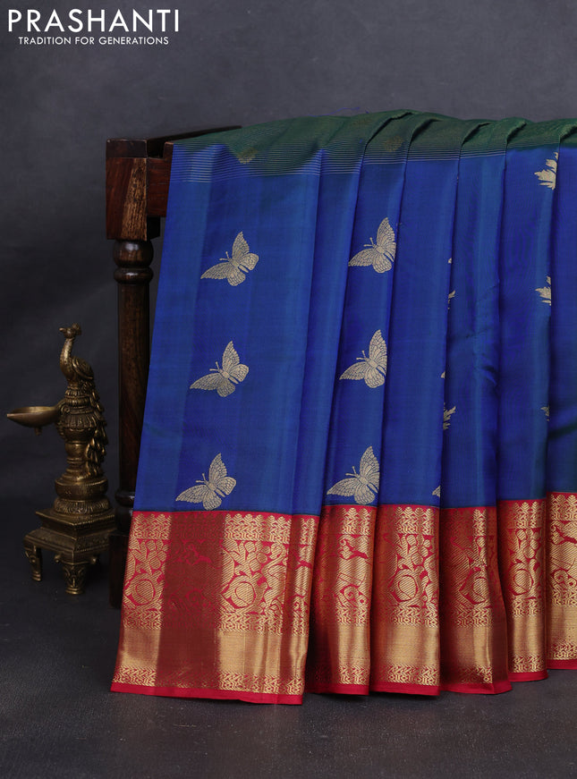 Pure kanchipuram silk saree dual shade of bluish green and reddish pink with allover zari weaves & buttas and rich zari woven korvai border