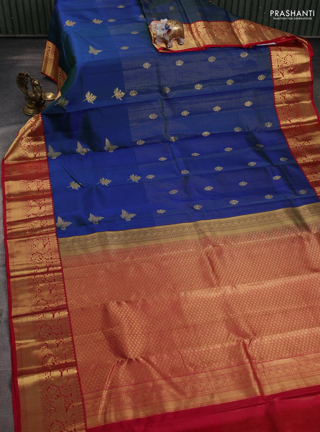 Pure kanchipuram silk saree dual shade of bluish green and reddish pink with allover zari weaves & buttas and rich zari woven korvai border