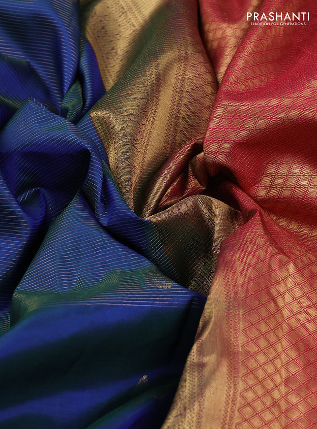 Pure kanchipuram silk saree dual shade of bluish green and reddish pink with allover zari weaves & buttas and rich zari woven korvai border