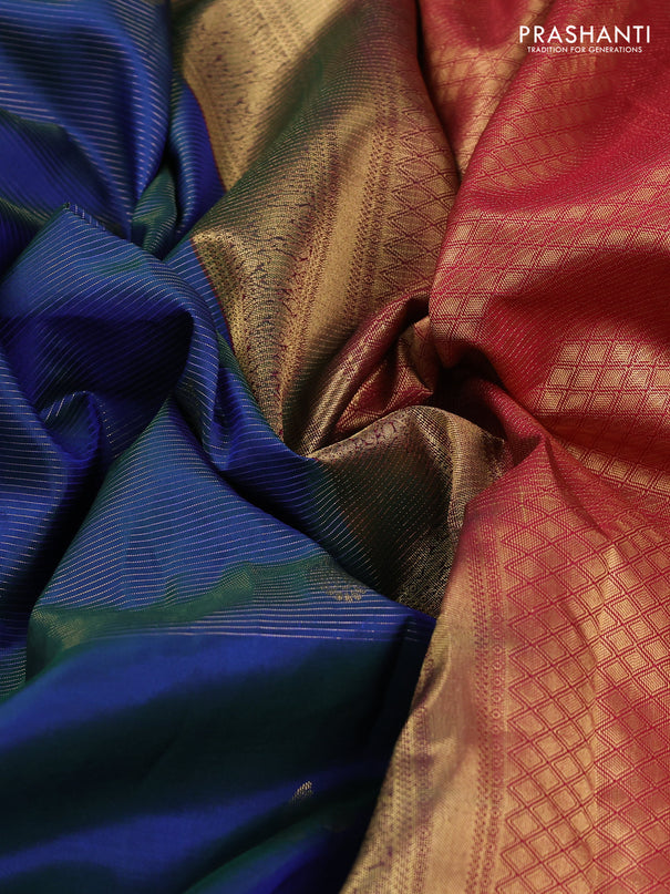 Pure kanchipuram silk saree dual shade of bluish green and reddish pink with allover zari weaves & buttas and rich zari woven korvai border