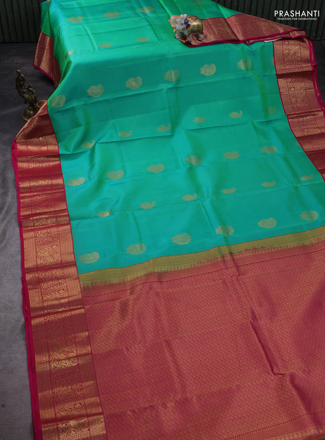 Pure kanchipuram silk saree teal green and pink with paisley zari woven buttas and zari woven korvai border